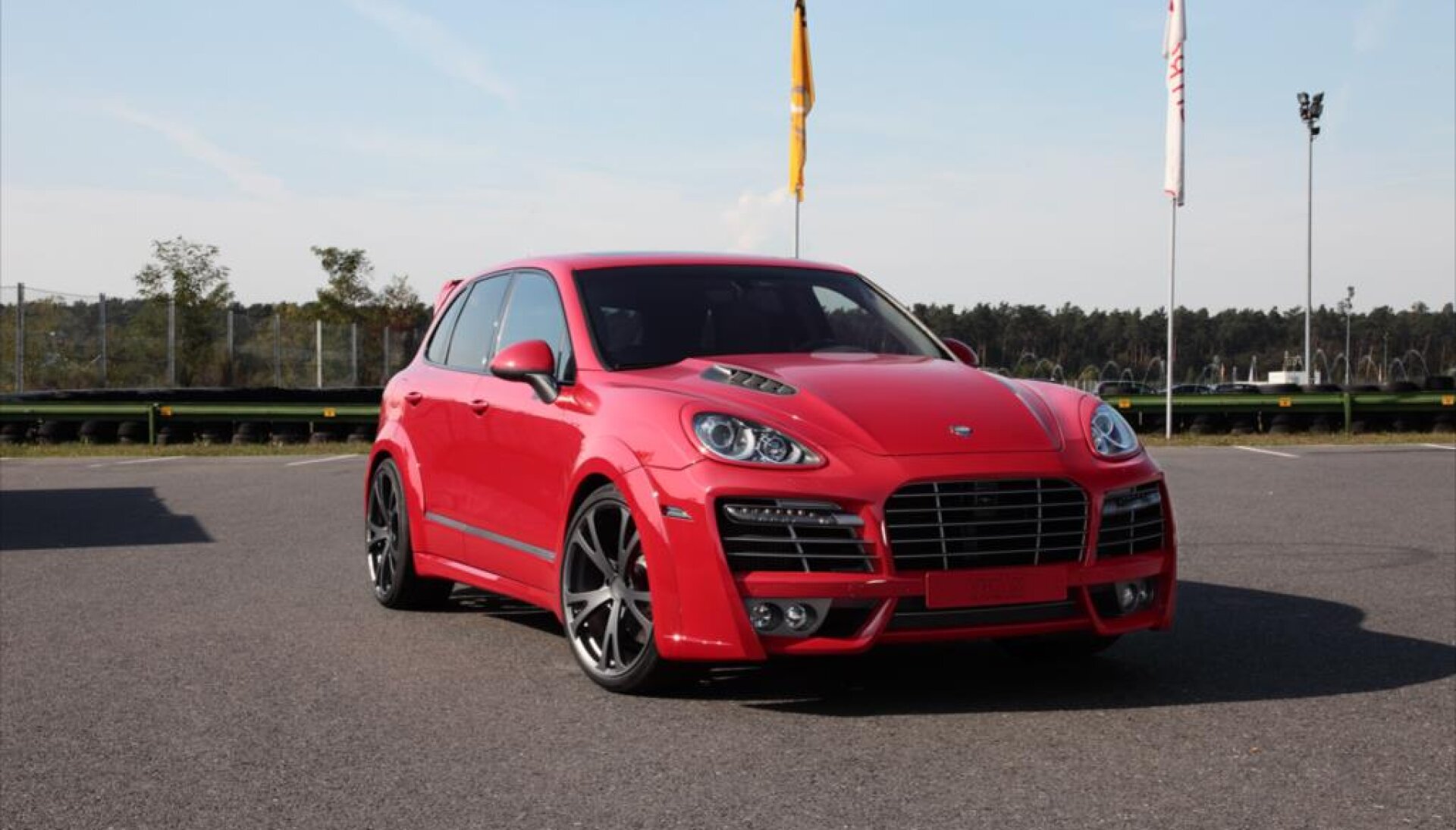 Porsche Cayenne Turbo TechArt Magnum red