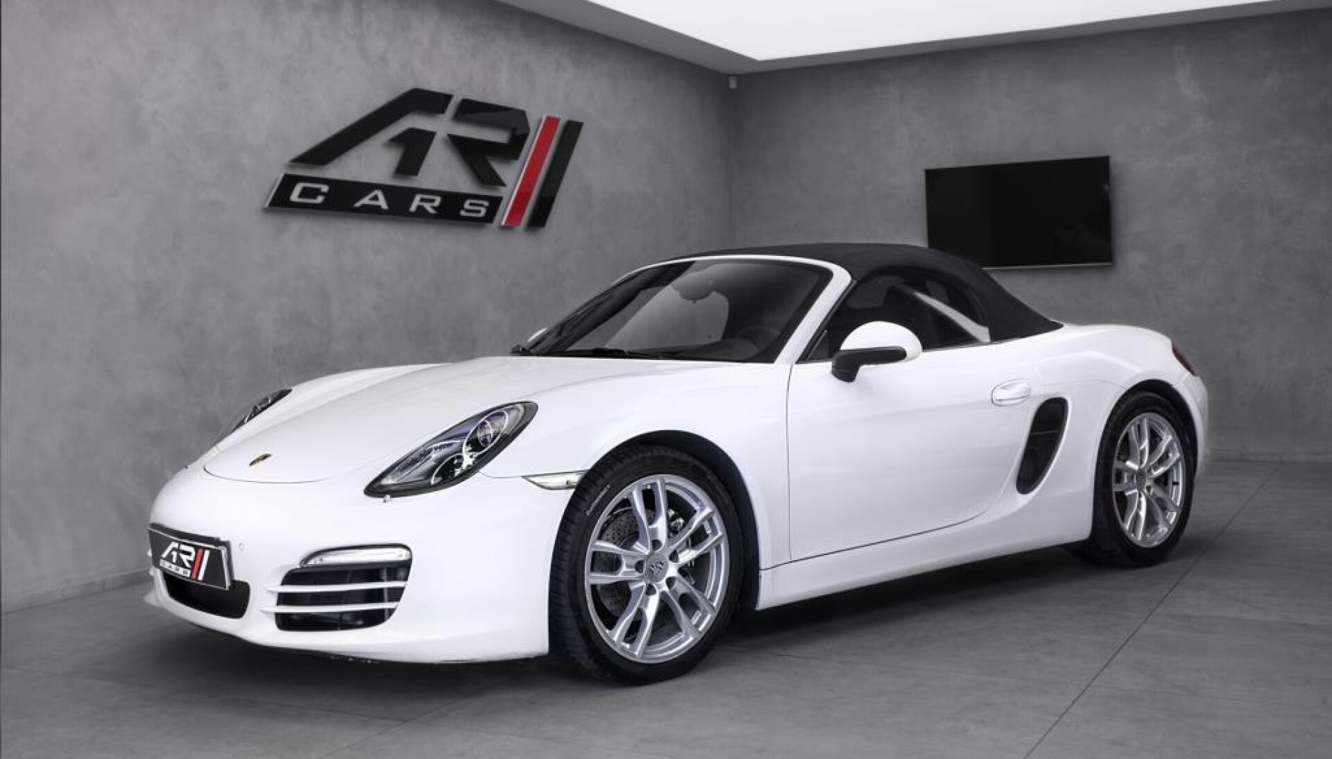 Porsche Boxster 2.7 sportovní výfuky, PDLS, Alcantara, navigace