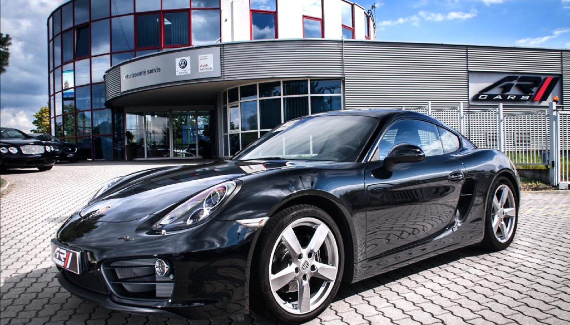 Porsche Cayman PDK, aktivní podvozek PASM, PDLS světlomety